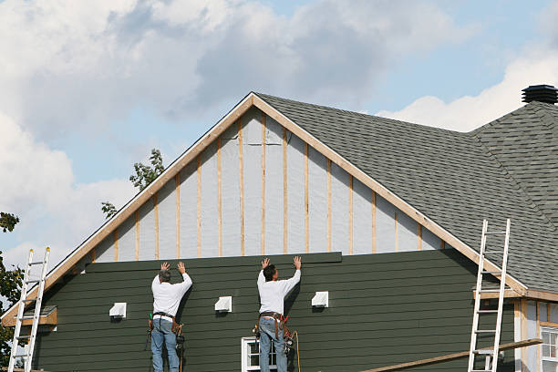 Professional Siding Contractor technician working in Hathorne, MA